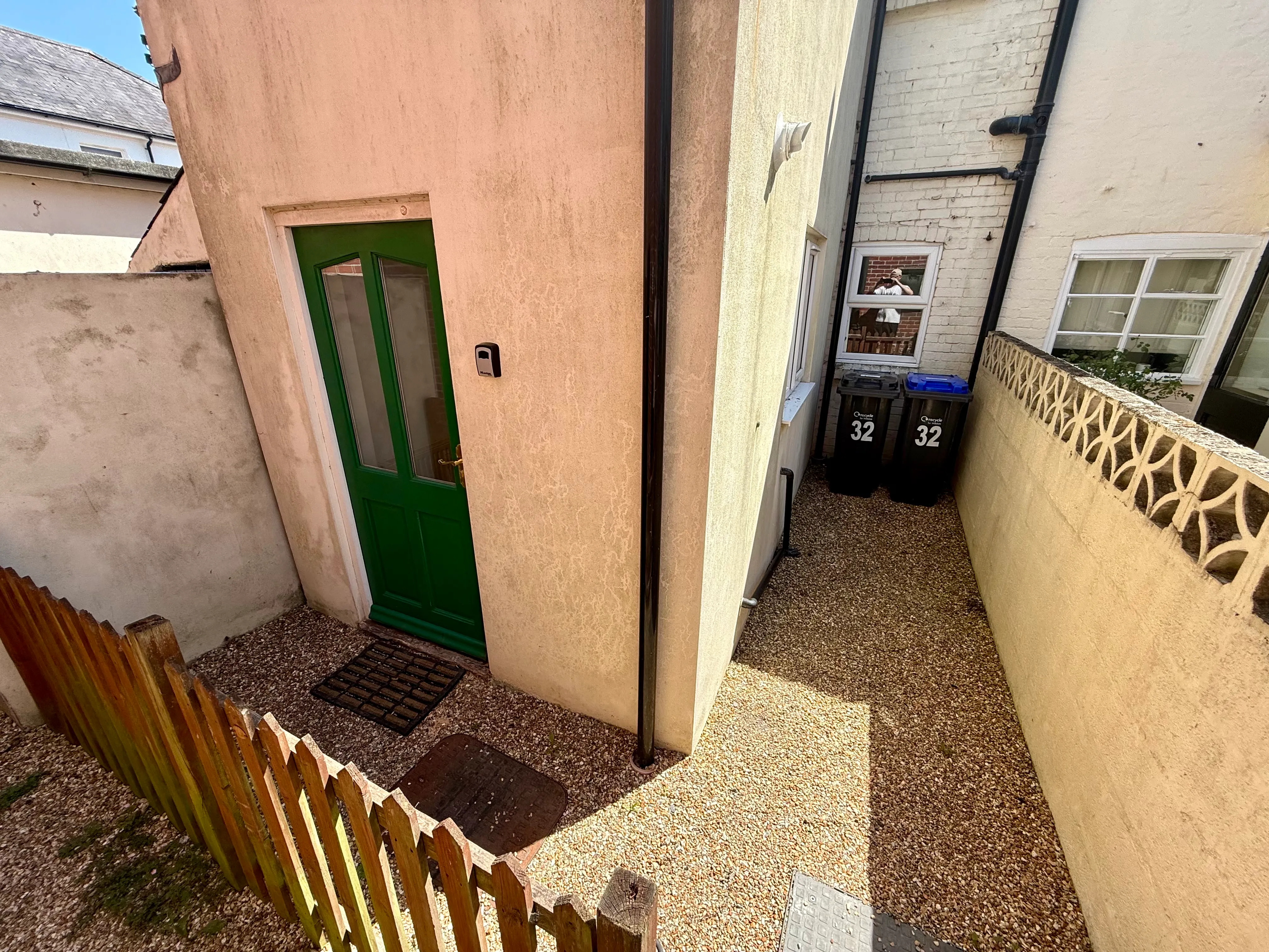 The enclosed rear courtyard — handy for dogs, morning coffee and muddy boots
